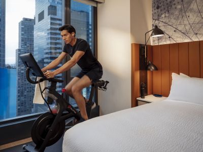 Through Hiltons Connected Room Experience (CREx) guests can now access a complimentary collection of Pelotons on-demand fitness content on their in-room TVs