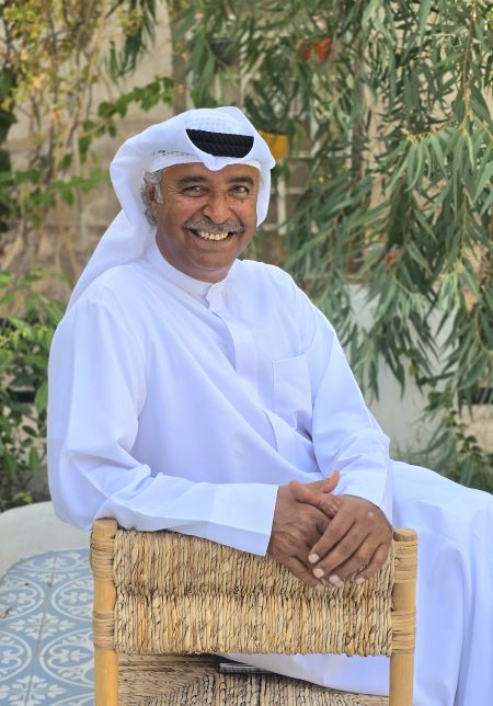 Ali Alrais, Co-Owner of Arabian Boutique Hotel in the hotel courtyard