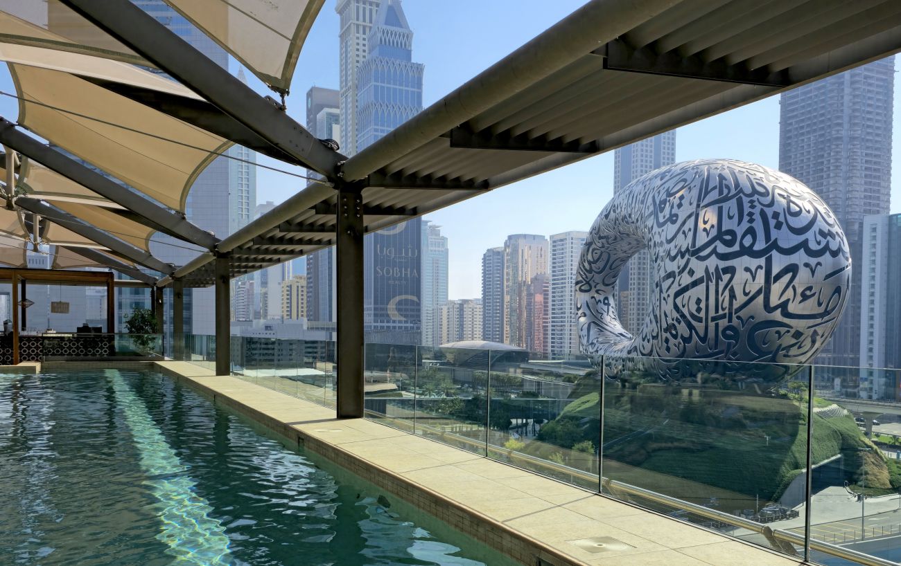 Rooftop Pool with a view on the Museum of The Future at the 25hours One Central Dubai