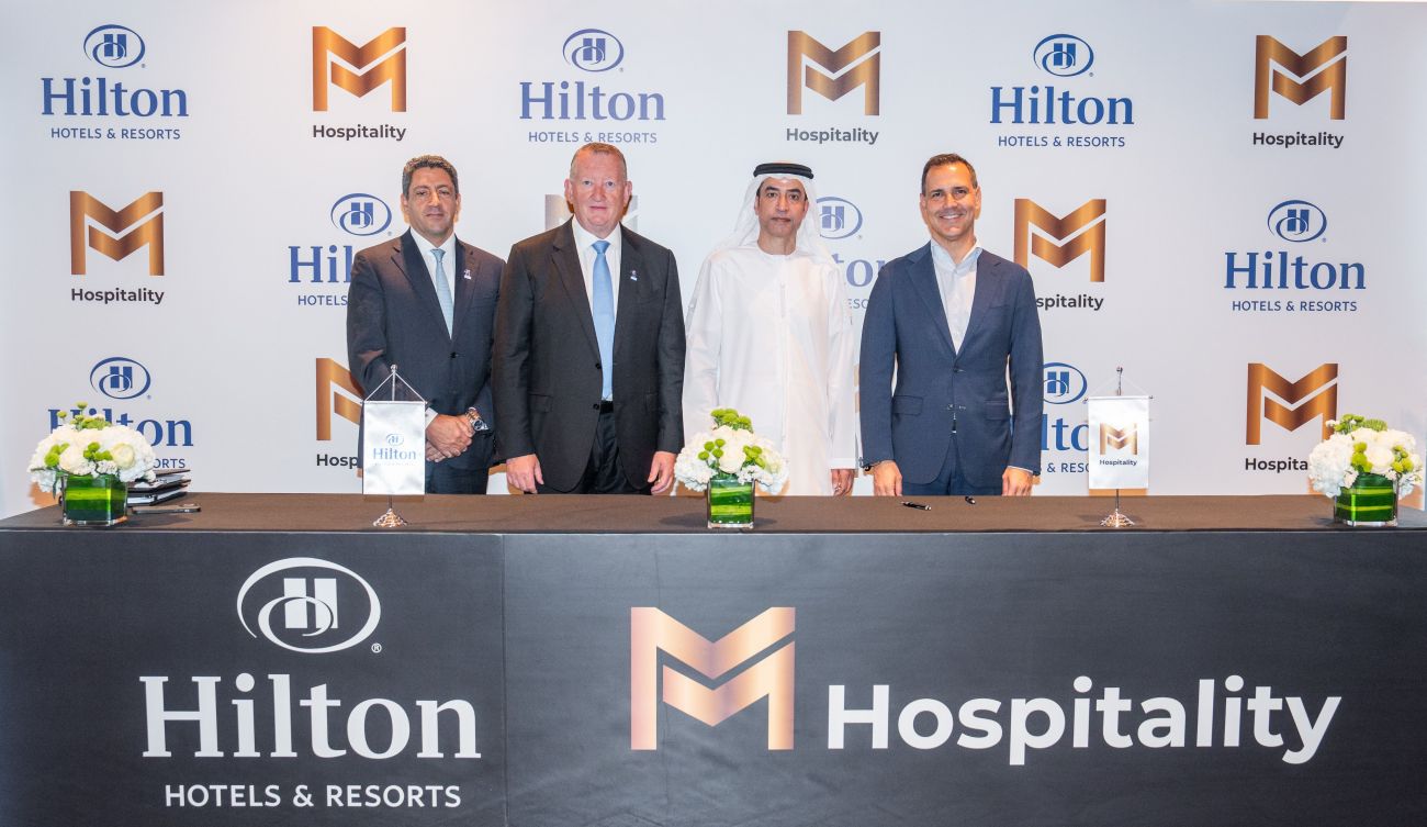 Signing of Hilton Marjan Island Beach Resort & Spa  (Left to Right): Carlos Khneisser, VP, Development, Middle East & Africa, Hilton; Patrick Fitzgibbon, SVP, Development, Europe, Middle East & Africa, Hilton; Mohammed Ruqait, Chairman of M Hospitality, Raki Phillips, CEO, Ras Al Khaimah Tourism Development Authority (RAKTDA)