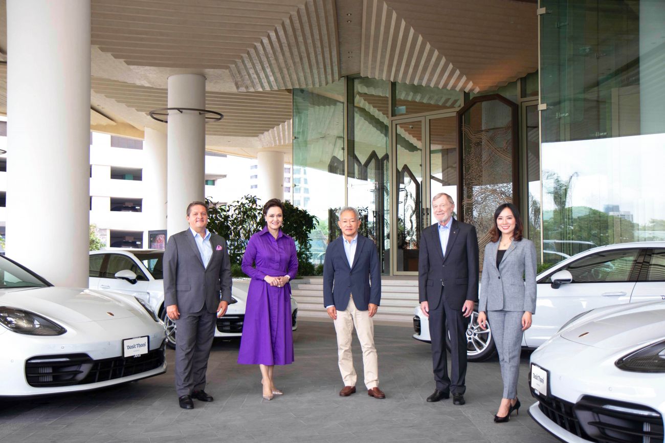 Dusit's partnership with Porsche Thailand is a testament to the company's dedication to providing extraordinary experiences for guests. Pictured (from left): Mr Adrian Rudin, Managing Director, Dusit Thani Bangkok; Ms Suphajee Suthumpun, Group CEO, Dusit International; Mr Chanin Donavanik, Vice Chairman and Chairman of the Executive Committee, Dusit International; Mr Peter Rohwer, Managing Director of Porsche Thailand by AAS Group; and Ms Pawarapa Dupassakoon, Marketing & PR Director, Porsche Thailand by AAS Group