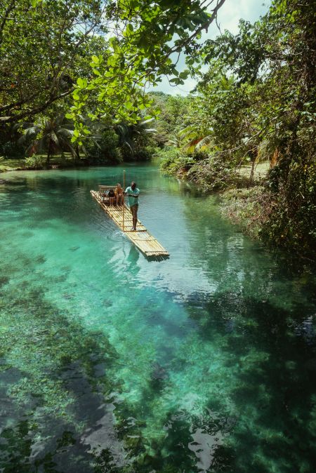 Bamboo rafting down crystal-clear rivers in Port Antonio