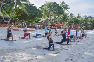 World Wellness Weekend yoga beach